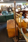 (R5) VINTAGE WOODEN ANTIQUE COAT RACK; 4 HOOKS, ROUND BASE ON 4 WOODEN LEGS. STANDS ABOUT 68 IN