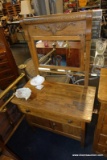 (R5) VINTAGE OAK WASHSTAND WITH ATTACHED MIRROR; JELLY ROLL TOP EDGE OVER CARVED FAN DETAIL ON TOP
