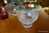 (R5) VINTAGE CUT GLASS PEDESTAL BOWL; HAS SPOUT AND SINGLE LOOP HANDLE. MEASURES 7.5 IN DIAMETER AND