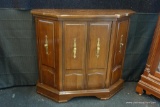 (WIN) WOODEN CONSOLE CABINET; ANGLED FRONT WITH 4 PANELED FRONT SIDES, 2 OF WHICH ARE DOORS TO OPEN