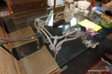 (R5) GLASS TOP DINING TABLE WITH WROUGHT IRON SCROLLING LEGS AND BASE; BEVELED GLASS TOP, AND FRAME.