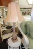 (WIN) TABLE LAMP; TALL TAN COLORED TABLE LAMP WITH SHAPED LIKE A COLUMN, WITH A SCALLOPED SEASHELL
