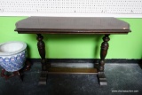 (R1) VINTAGE MAHOGANY CONSOLE/LIBRARY TABLE; RECTANGULAR WITH ARCHING SIDES AND TRESTLE BASE. SOME