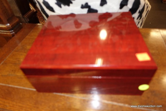 (WIN) CHERRY HUMIDOR; LOVELY CHERRY HUMIDOR WITH HYGROMETER INSIDE. MEASURES 10 IN X 8.5 IN X 4 IN.