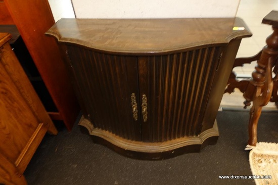 (WIN) DARK WOOD CONSOLE CABINET; HAS 2 DOORS WITH LOVELY CARVED DETAIL, AND INTRICATE HARDWARE.