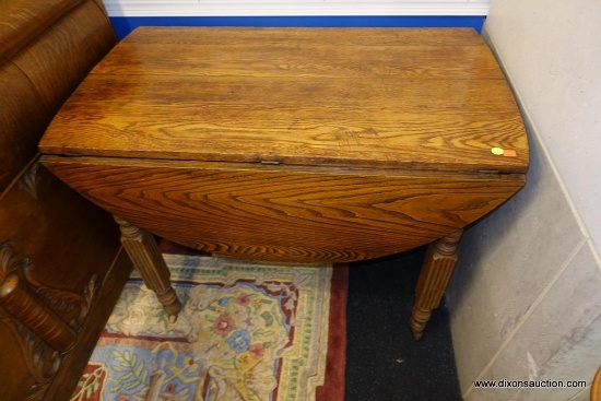 (WIN) WOODEN DROP LEAF TABLE; NICE TABLE WITH 4 NICELY DETAILED LEGS, WITH SMALL CASTORS FOR