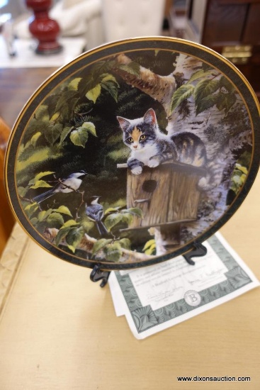 (WIN) DECORATIVE PLATE BY PERSIS WEIRS; DECORATIVE PLATE W/STAND, "HOUSE SITTING" FEATURES A CAT