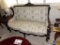 (LR) ELEGANT VICTORIAN SETTEE; BEAUTIFUL RICH WOOD FRAME WITH ANGELS AND FLOWERS CARVED INTO THE