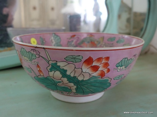(BED) ORIENTAL STYLE BOWL; SHADES OF PINK, PURPLE, AND GREEN WITH FLOWERS AND BUTTERFLIES. SIGNED IN
