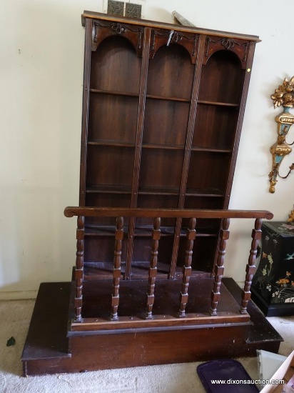 (LR) UNIQUE WOODEN BOOKCASE WITH BANNISTER AND STEPS.; THIS BOOKCASE IS ATTACHED TO A PLATFORM WITH