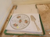 (DR) CAKE SET; GLASS CAKE SET WITH SERVING KNIFE. CAKE PLATE HAS BEAUTIFUL PINK AND GREEN FLOWERS ON