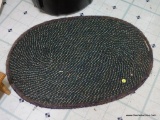 (KIT) WOVEN RUG; SMALL GREEN AND MULTICOLORED WOVEN RUG. MEASURES 31 IN BY 21.5