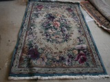 (BAS) ORIENTAL RUG BY THE GABBEH COLLECTION; LIGHT GREEN-BLUE PRIMARY COLOR WITH FLORAL BORDER AND