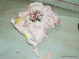 (BED) PORCELAIN CHERUB HANGING VASE; FAN SHAPED PORCELAIN VASE WITH A CHERUB ON LOWER LEFT N PASTELS