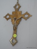 (BED) BRASS CRUCIFIX WALL HANGING; MEASURES 11 IN TALL AND 8 IN WIDE.