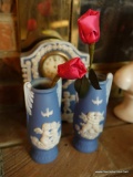 (LR) DEPOSE MANTLE CLOCK AND VASE LOT; 2 CERAMIC VASES WITH CHERUBS, BLUE AND WHITE IN COLOR.
