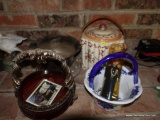 (LR) CERAMIC, GLASS, AND METAL BASKET LOT; INCLUDES ONE SILVERPLATED SHAPED DISH, AN ORANGE GLASS