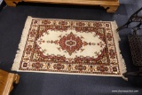 CREAM/RED FRINGED AREA RUG