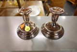 WEIGHTED SILVER-PLATE CANDLESTICKS