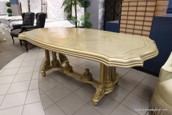 GOLD COLORED TRESTLE BASE DINING TABLE