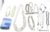 BAG LOT OF MISC. COSTUME JEWELRY. INCLUDES WIRE NECKLACES, PEARL DESIGN NECKLACES, A BEADED