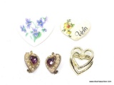 LOT OF HEART SHAPED PINS AND BROOCHES. 2 HAVE A FLORAL DESIGN ON THEM, 1 IS A DOUBLE HEART WITH A