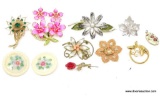 FLORAL PIN AND BROOCH LOT. INCLUDES A HOT PINK FLOWER BROOCH WITH MATCHING CLIP ON EARRINGS, A