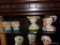 (LR) SHELF LOT - 2 PORCELAIN BUSTS AND A PAIR OF HEAD SALT AND PEPPER SHAKERS