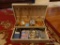 (DEN) JEWELRY BOX WITH CONTENTS OF COSTUME JEWELRY- NECKLACES, EARRINGS AND PINS