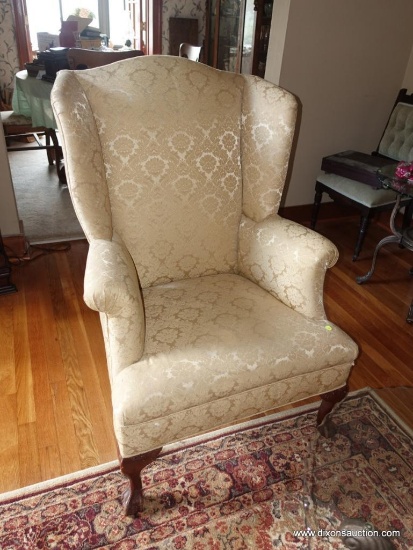 (LR) VINTAGE CHERRY BALL AND CLAW WING CHAIR- BEIGE FLORAL UPHOLSTERY IN EXCELLENT CONDITION- 33"W X