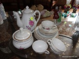 (LR) 14 PC. CHILD'S PORCELAIN TEA SET- 4 DESSERT PLATES, 4 CUPS AND SAUCERS, SUGAR AND 7