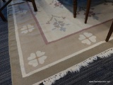 WOVEN PASTEL FLORAL AREA RUG