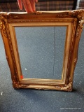 CARVED GOLD PAINTED FRAME WITH LINEN BORDER