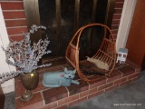 (DEN) CONTENTS ON HEARTH- COPPER URN WITH DRIED FLORAL ARRANGEMENT, CLOTH CAT COVERED BRICK