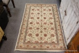 CREAM AND MAROON AREA RUG