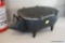 (LAU) CAST IRON GRILL; BLACK IN COLOR, SHAPED LIKE A PIG, HAS REMOVABLE GRATES INSIDE AND ON TOP,