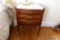 (BBR) JOHN WIDDICOMB 3 DRAWER NIGHT STAND; TOP SURFACE IS INSET WHITE MARBLE WITH A SLIGHT GALLERY