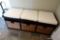 (MUD) MUD ROOM BENCH SEAT WITH STORAGE BINS; 3 CREAM COLORED SEAT CUSHIONS ON TOP WITH 3 CUBE SHAPED