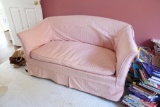 (PINK) PINK LOVESEAT WITH SLIPCOVER; PINK SINGLE CUSHION LOVESEAT WITH SLIPCOVER AND PINK PILLOW: 54