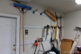 (GAR1) CONTENTS OF WALL; TOOL CONTENTS OF WALL: BLACK AND DECKER HEDGE TRIMMER, BROOMS, RAKES, HAND