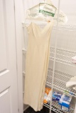 (CLO2) LADIES FORMAL EVENING GOWN; CREAM COLORED AND SLIGHTLY TEXTURED FABRIC MAKE THIS SLEEVELESS