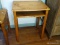 (DOWN BED) VINTAGE MAPLE SCHOOL DESK ( NO CHAIR AND NO STUDENT ART WORK ON TOP)-HAS SHELF FOR BOOKS-