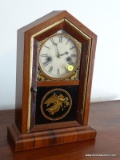 (DOWN BED) ANTIQUE WATERBURY 8 DAY CLOCK IN ROSEWOOD CASE- REVERSE PAINTING ON GLASS- WORKS, HAS KEY