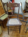 (BED 3) ANTIQUE OAK PRESSED BACK CHAIR WITH CANE BOTTOM SEAT- 17