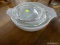 VINTAGE PYREX; 4 TOTAL PIECES. WHITE BOWLS WITH AVOCADO GREEN FLORAL PATTERN, AND 2 CLEAR GLASS