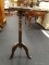 MAHOGANY PLANT STAND; 3 LEGGED MAHOGANY PLANT STAND. STANDS 8.5 IN X 25 IN