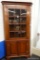 HENKEL HARRIS CORNER CABINET; ELEGANTLY CONSTRUCTED AND GORGEOUS WILD BLACK CHERRY MAKES THIS PIECE