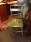 TOLE PAINTED CHAIR; GREEN TOLE PAINTED PLANK BOTTOM CHAIR. MEASURES 16 IN X 15 IN X 34 IN