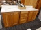 QUALITY CABINETS BRAND DOUBLE SINK; OAK BODY AND WHITE COUNTERTOP DOUBLE SINK BATH FIXTURE WITH 2