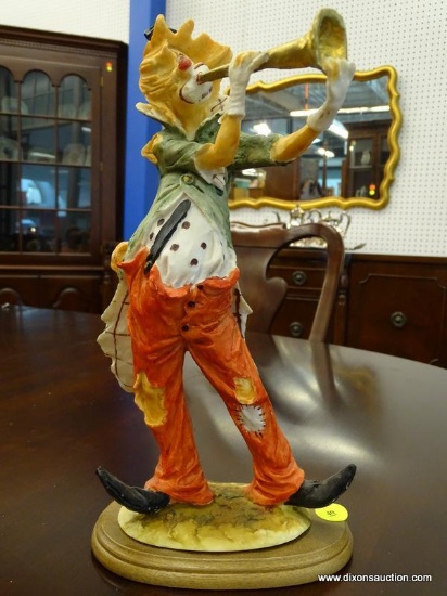 COLLECTIBLE CLOWN FIGURINE BY INTERPUR; VINTAGE LOOK HOBO CLOWN PLAYING A HORN, MOUNTED ON AN OVAL